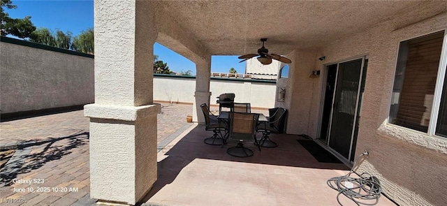 6275 Allspice Ct, Las Vegas, NV 89142 - view of patio featuring ceiling fan and outdoor dining area