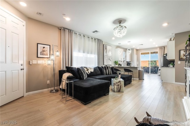 2845 Mincio St, Henderson, NV 89044 - living area with light wood-style flooring and recessed lighting