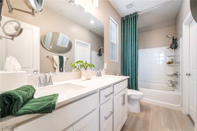 2845 Mincio St, Henderson, NV 89044 - bathroom with shower / bathtub combination with curtain, double vanity, and wood finished floors