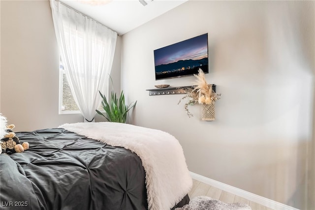2845 Mincio St, Henderson, NV 89044 - bedroom with wood finished floors and baseboards