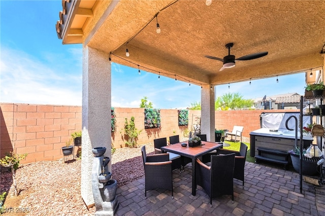 2845 Mincio St, Henderson, NV 89044 - fenced backyard with a patio area, outdoor dining area, and a ceiling fan