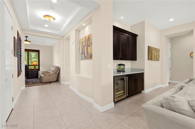 6810 Silver Crescent St, Las Vegas, NV 89148 - hallway with wine cooler, light tile patterned flooring, and recessed lighting