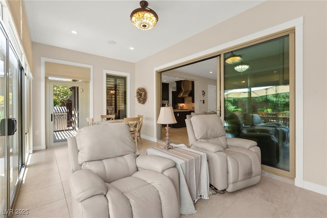 6810 Silver Crescent St, Las Vegas, NV 89148 - living room with light tile patterned floors, a chandelier, and recessed lighting