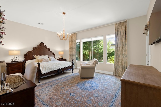 6810 Silver Crescent St, Las Vegas, NV 89148 - bedroom with a chandelier and baseboards