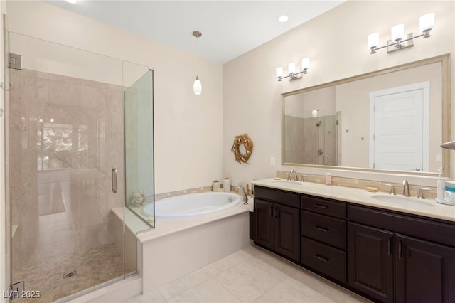6810 Silver Crescent St, Las Vegas, NV 89148 - full bathroom with a garden tub, double vanity, a stall shower, and tile patterned flooring