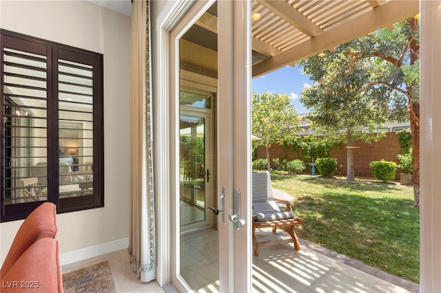 6810 Silver Crescent St, Las Vegas, NV 89148 - doorway to outside featuring baseboards and tile patterned floors