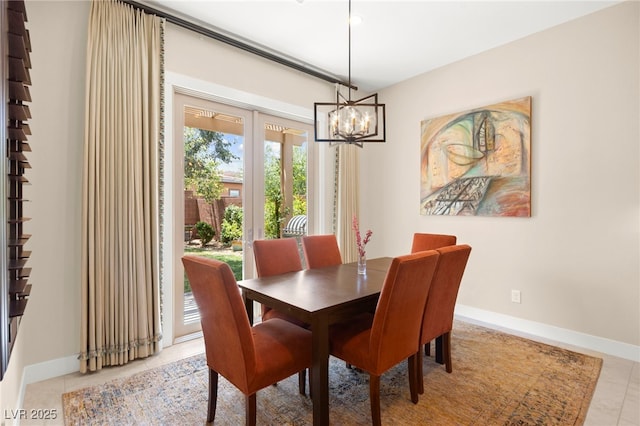 6810 Silver Crescent St, Las Vegas, NV 89148 - dining room with a chandelier and light tile patterned floors
