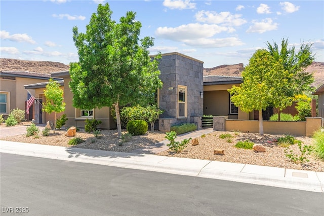 6810 Silver Crescent St, Las Vegas, NV 89148 - view of front of home featuring stucco siding