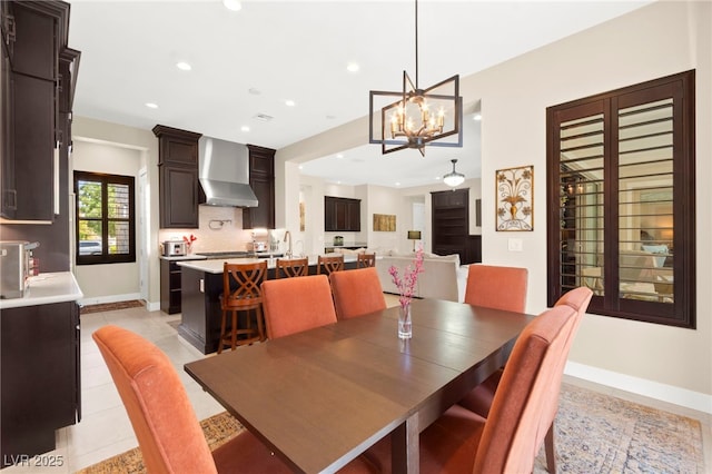 6810 Silver Crescent St, Las Vegas, NV 89148 - dining space with a chandelier, recessed lighting, and light tile patterned floors