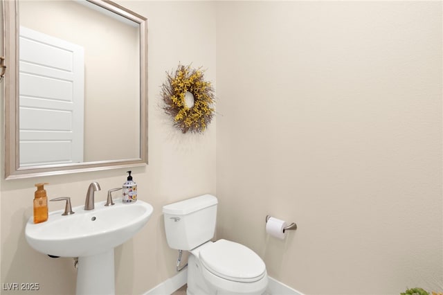 6810 Silver Crescent St, Las Vegas, NV 89148 - half bathroom with baseboards and toilet