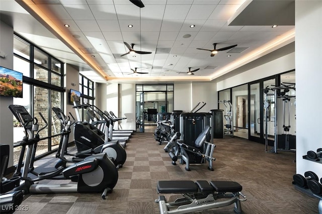 6810 Silver Crescent St, Las Vegas, NV 89148 - exercise room featuring a ceiling fan, carpet floors, a drop ceiling, floor to ceiling windows, and french doors