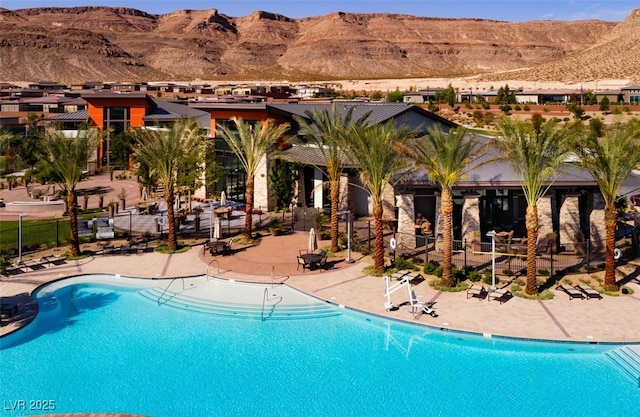6810 Silver Crescent St, Las Vegas, NV 89148 - community pool with a mountain view