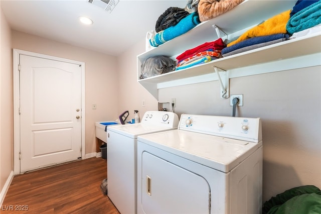 4656 E Desert Inn Rd, Las Vegas, NV 89121 - washroom featuring independent washer and dryer, dark wood-style floors, and recessed lighting