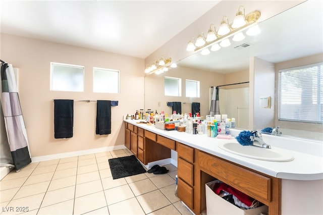 4656 E Desert Inn Rd, Las Vegas, NV 89121 - full bathroom with double vanity, tile patterned flooring, and a shower with shower curtain
