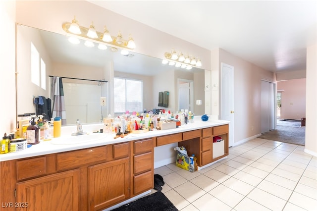 4656 E Desert Inn Rd, Las Vegas, NV 89121 - bathroom with vanity, tile patterned floors, and curtained shower