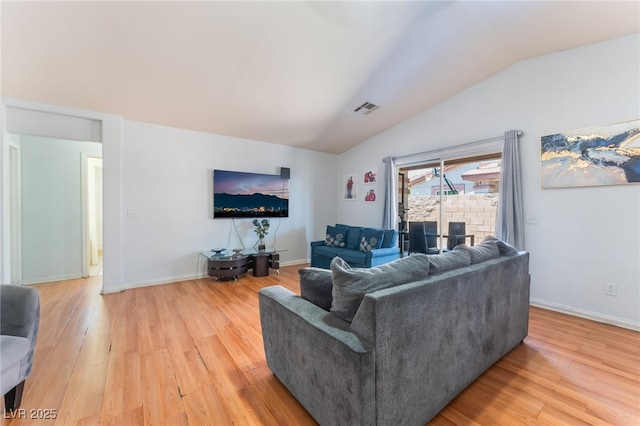 4656 E Desert Inn Rd, Las Vegas, NV 89121 - living area featuring lofted ceiling and light wood-type flooring