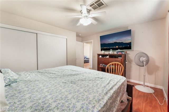4656 E Desert Inn Rd, Las Vegas, NV 89121 - bedroom with a closet, wood finished floors, and ceiling fan