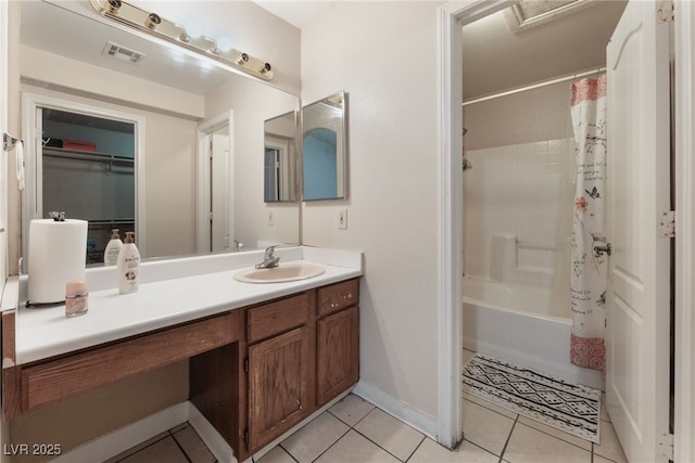 4656 E Desert Inn Rd, Las Vegas, NV 89121 - bathroom featuring vanity, tile patterned flooring, and shower / tub combo