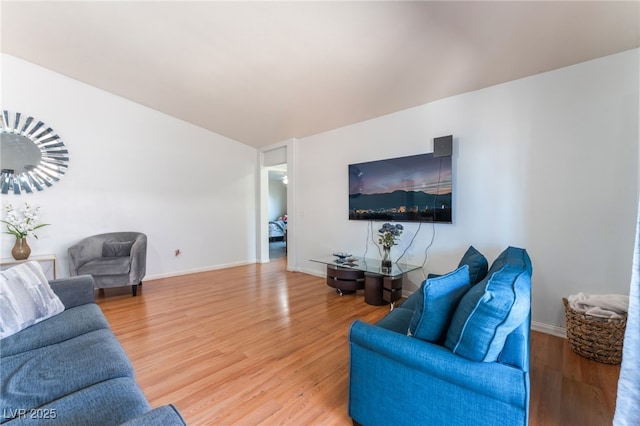 4656 E Desert Inn Rd, Las Vegas, NV 89121 - living room featuring wood finished floors and baseboards