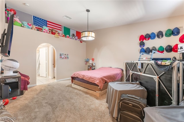 4656 E Desert Inn Rd, Las Vegas, NV 89121 - bedroom with arched walkways and carpet floors