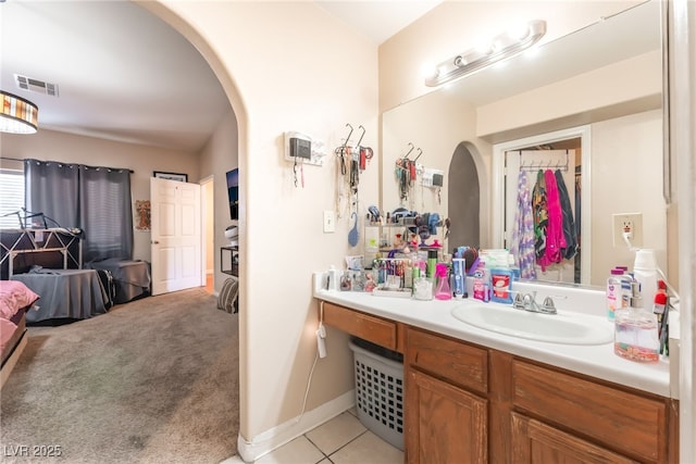 4656 E Desert Inn Rd, Las Vegas, NV 89121 - bathroom with vanity and tile patterned flooring