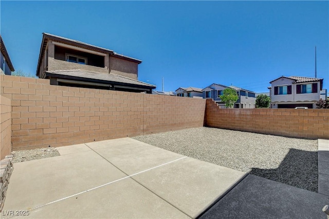 4240 Spring Storm Ave, North Las Vegas, NV 89081 - fenced backyard featuring a patio