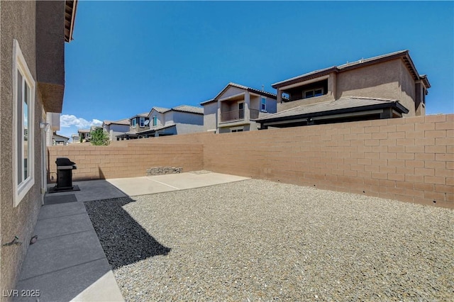 4240 Spring Storm Ave, North Las Vegas, NV 89081 - fenced backyard featuring a patio area