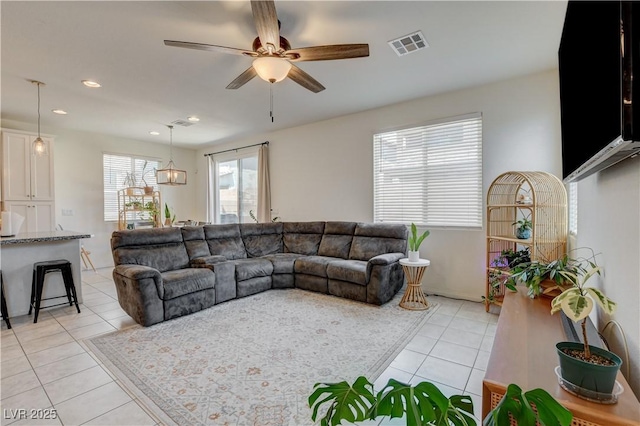 4240 Spring Storm Ave, North Las Vegas, NV 89081 - living room featuring light tile patterned floors, ceiling fan, and recessed lighting