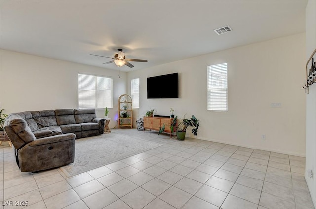 4240 Spring Storm Ave, North Las Vegas, NV 89081 - living area featuring a ceiling fan and light tile patterned floors
