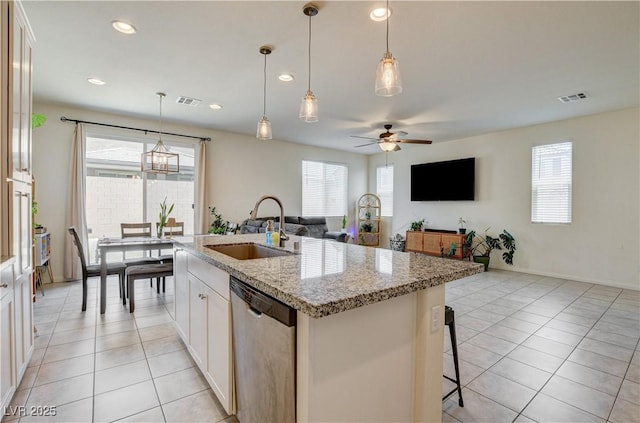 4240 Spring Storm Ave, North Las Vegas, NV 89081 - kitchen with dishwasher, healthy amount of natural light, open floor plan, ceiling fan, and recessed lighting