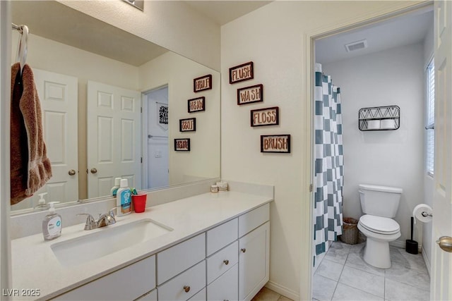 4240 Spring Storm Ave, North Las Vegas, NV 89081 - full bath featuring vanity, tile patterned flooring, and a shower with curtain