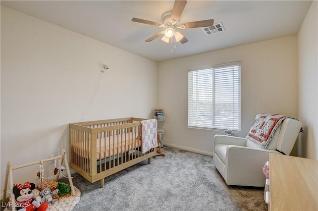 4240 Spring Storm Ave, North Las Vegas, NV 89081 - carpeted bedroom featuring ceiling fan and a nursery area
