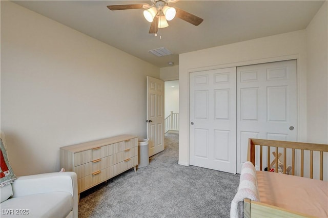4240 Spring Storm Ave, North Las Vegas, NV 89081 - bedroom featuring light colored carpet, a closet, and ceiling fan