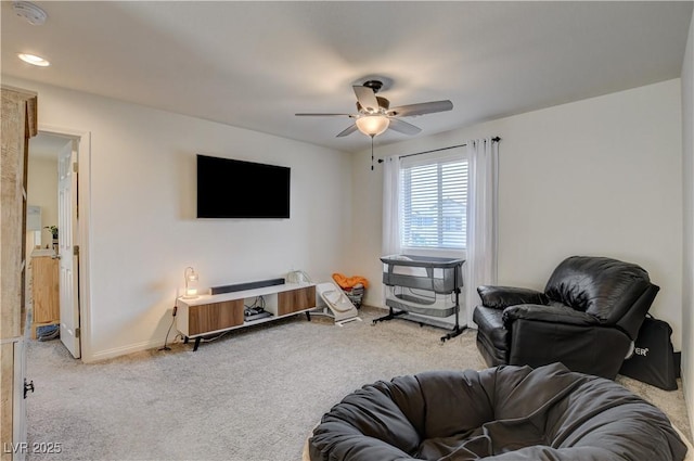 4240 Spring Storm Ave, North Las Vegas, NV 89081 - carpeted living room featuring a ceiling fan and baseboards