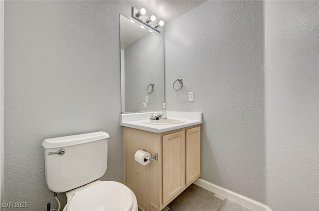 198 Winterport St, Henderson, NV 89074 - bathroom featuring tile patterned floors, vanity, and a textured wall
