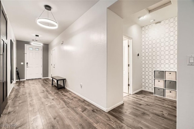 6233 Canterbury Field Rd, Las Vegas, NV 89113 - entrance foyer featuring wood finished floors and baseboards