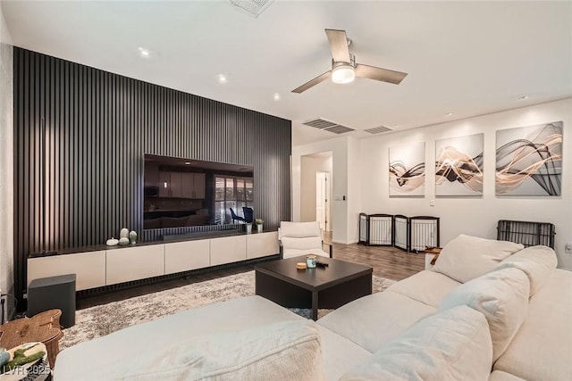 6233 Canterbury Field Rd, Las Vegas, NV 89113 - living area featuring wood finished floors, a ceiling fan, and recessed lighting