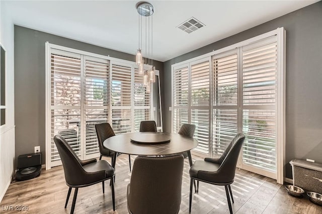 6233 Canterbury Field Rd, Las Vegas, NV 89113 - dining room with light wood-type flooring