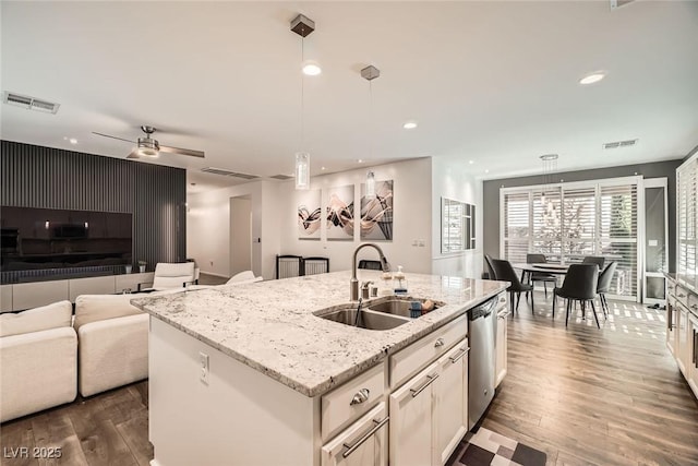 6233 Canterbury Field Rd, Las Vegas, NV 89113 - kitchen with stainless steel dishwasher, dark wood-style floors, pendant lighting, and recessed lighting