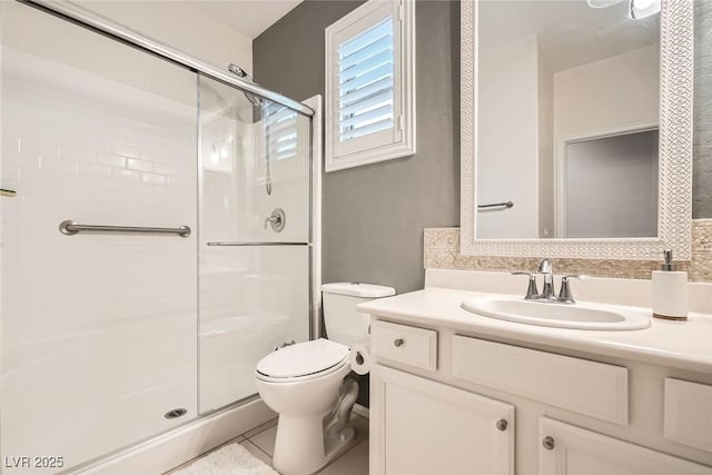 6233 Canterbury Field Rd, Las Vegas, NV 89113 - bathroom featuring a stall shower, vanity, and tile patterned floors