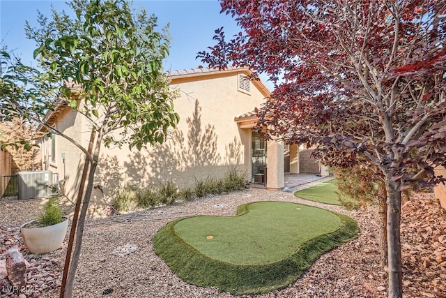 6233 Canterbury Field Rd, Las Vegas, NV 89113 - view of yard with a putting area
