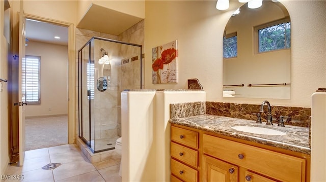 6120 Kings Brook Ct, Las Vegas, NV 89149 - bathroom with tile patterned floors, vanity, and a stall shower