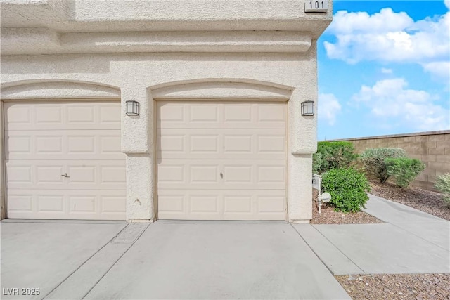 9315 Indian Corn Ct Unit 101, Las Vegas, NV 89178 - garage with concrete driveway