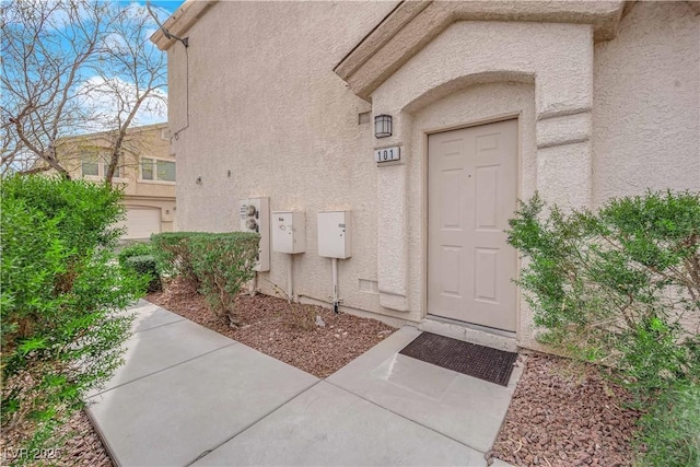 9315 Indian Corn Ct Unit 101, Las Vegas, NV 89178 - entrance to property featuring stucco siding