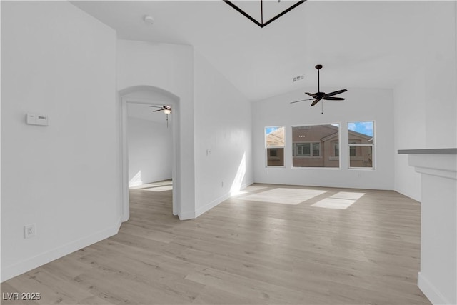 9315 Indian Corn Ct Unit 101, Las Vegas, NV 89178 - unfurnished living room with ceiling fan, lofted ceiling, and light wood-style flooring