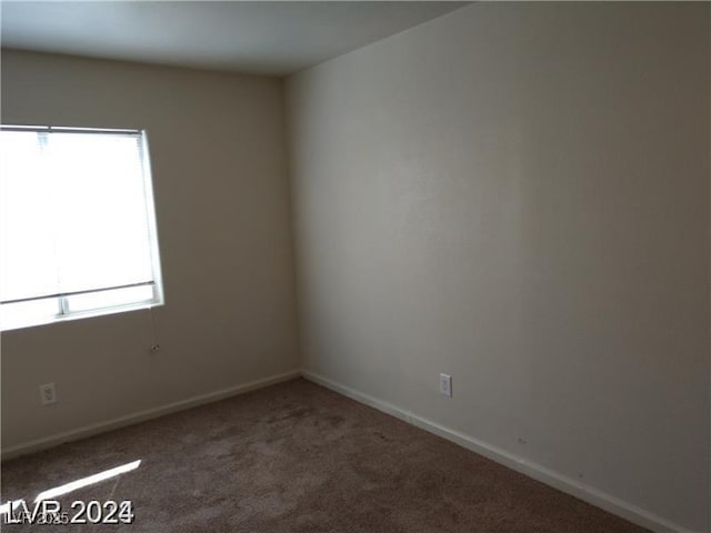 256 Camino Viejo St, Henderson, NV 89012 - carpeted spare room with baseboards