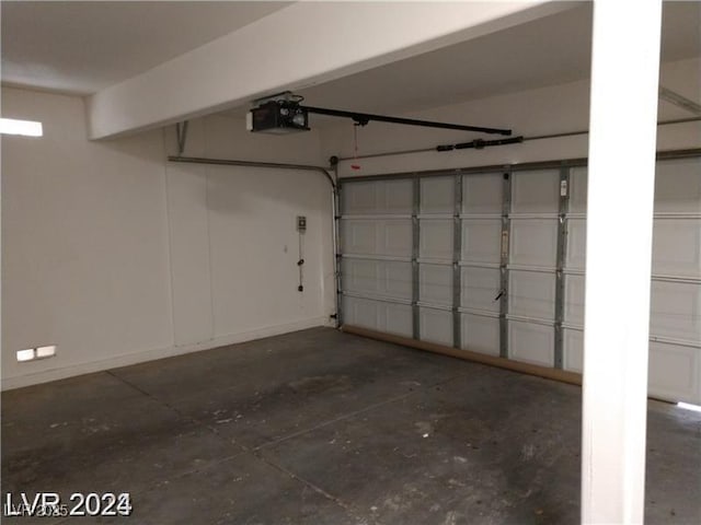 256 Camino Viejo St, Henderson, NV 89012 - garage with a garage door opener and baseboards