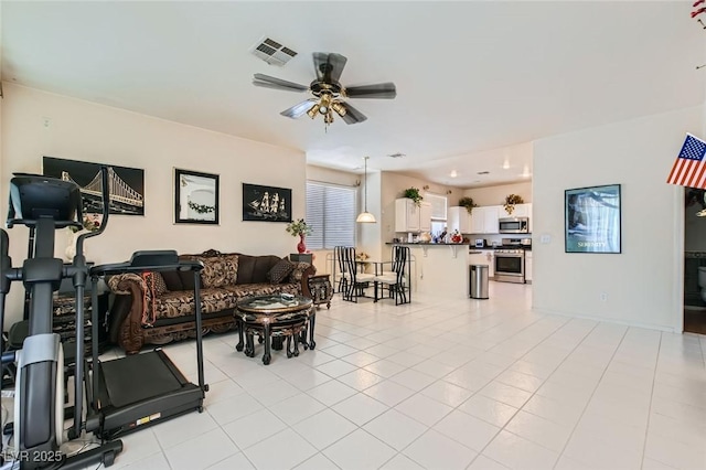 5409 Flora Spray St, Las Vegas, NV 89130 - living room featuring a ceiling fan and light tile patterned floors