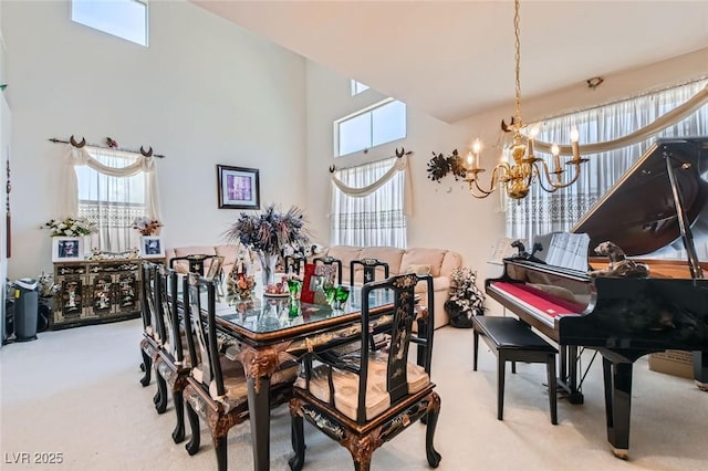 5409 Flora Spray St, Las Vegas, NV 89130 - carpeted dining space featuring a chandelier and a towering ceiling