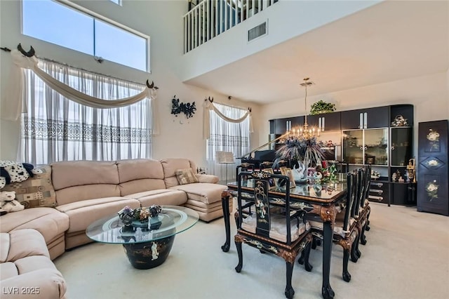 5409 Flora Spray St, Las Vegas, NV 89130 - carpeted living room featuring a chandelier